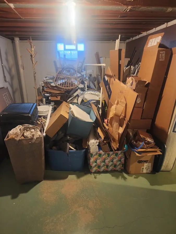 Roll-off dumpster container at job site for 6 Yard Dumpster Rental in Ada